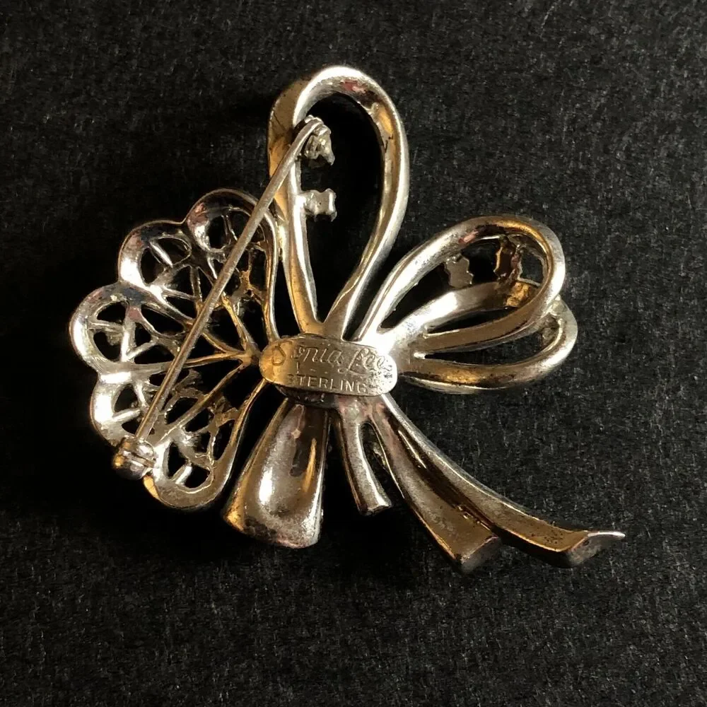 Sterling Silver Bow Brooch Sonia Lee 1940s Art Deco Rhinestone White Blue Vtg